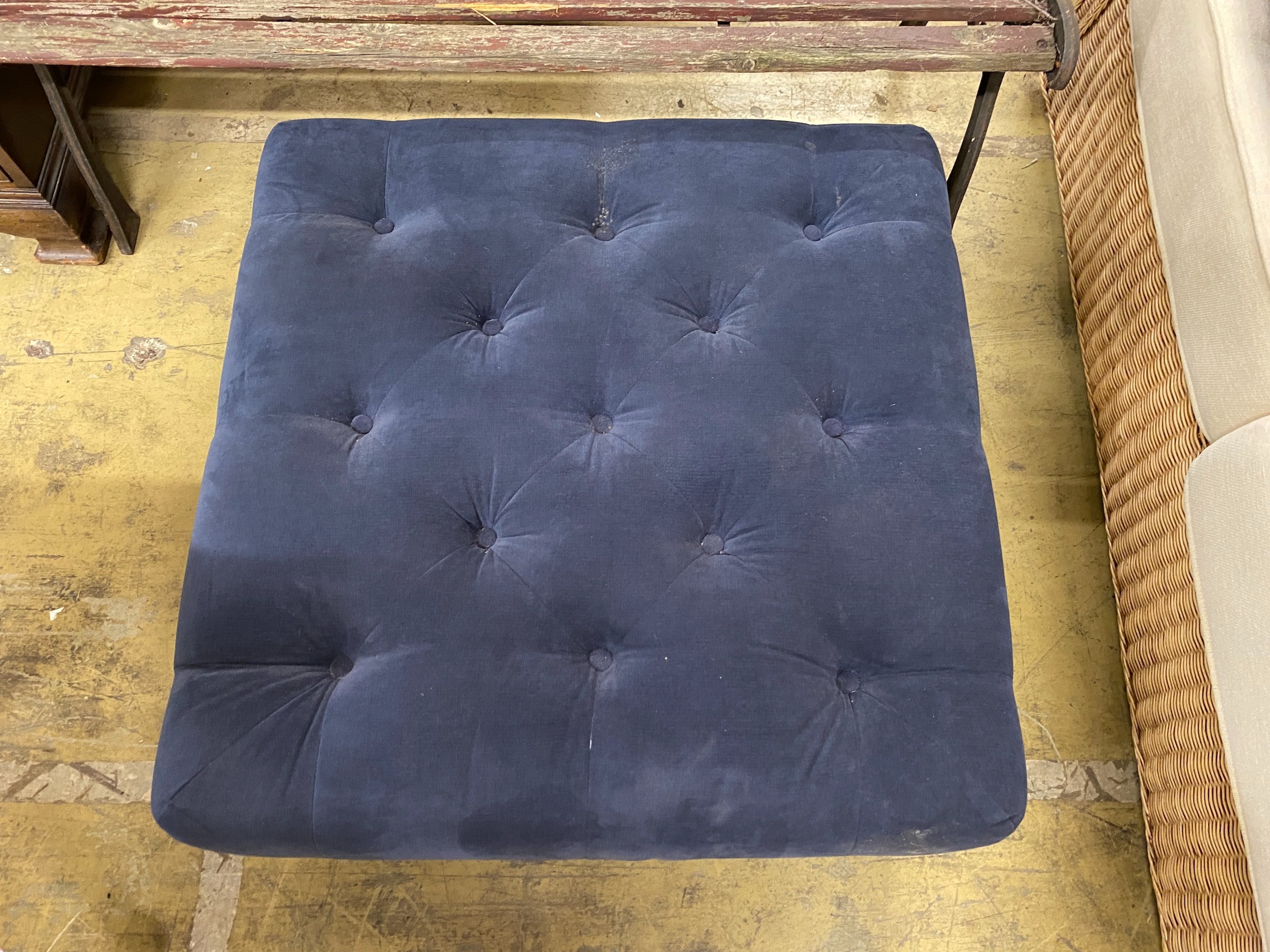 A contemporary buttoned blue fabric footstool, 80cm square, 33cm high